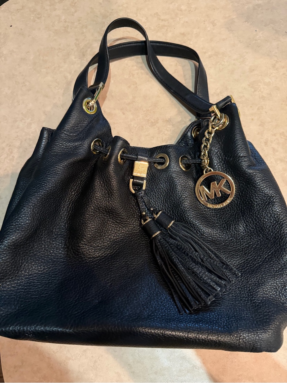 Michael Kors Black Leather Drawstring Shoulder Bag with Tassel and MK Charm